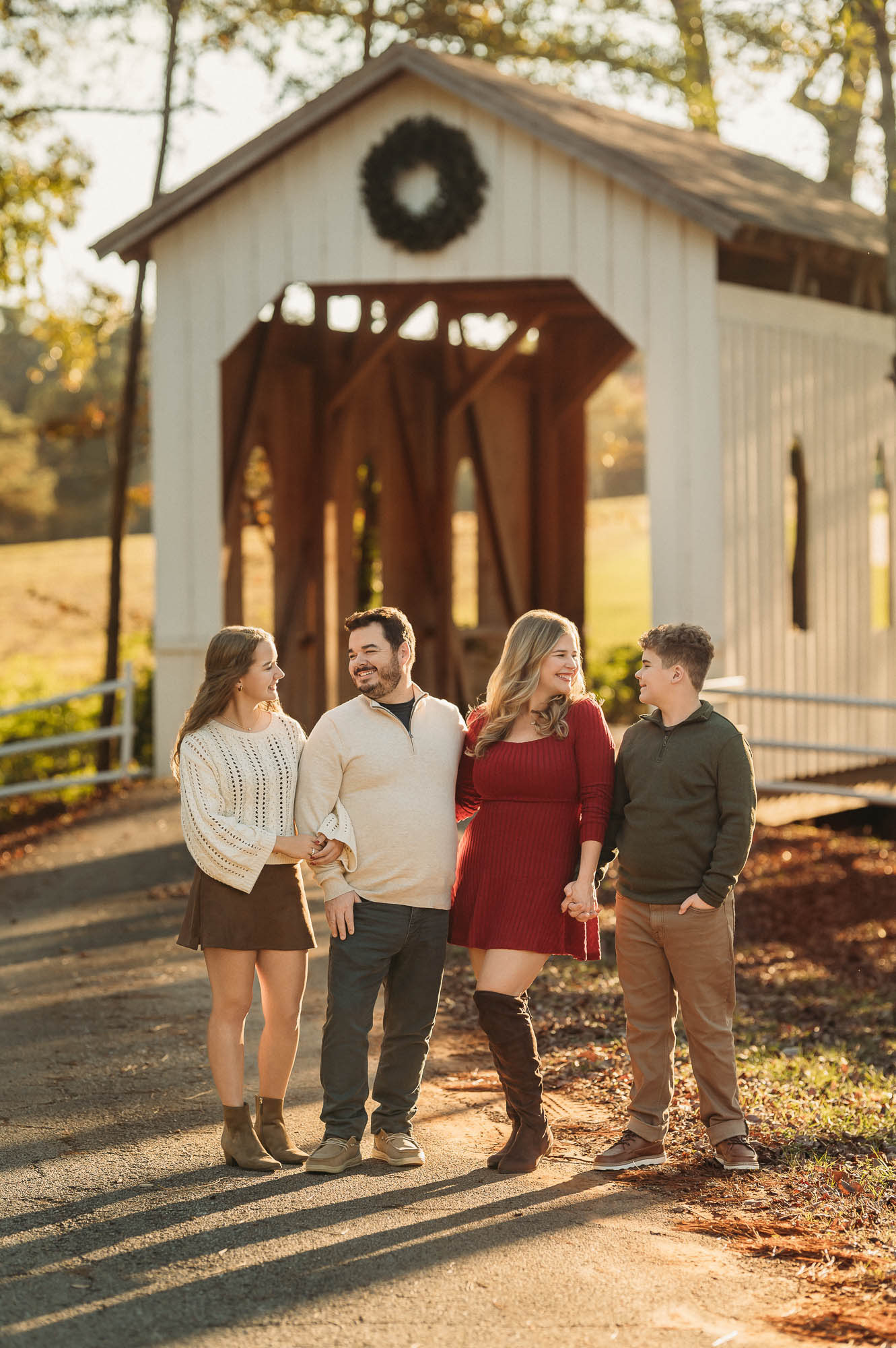 Family portraits on a wood bridge at The Madeaux | Flint Texas Family Photographer