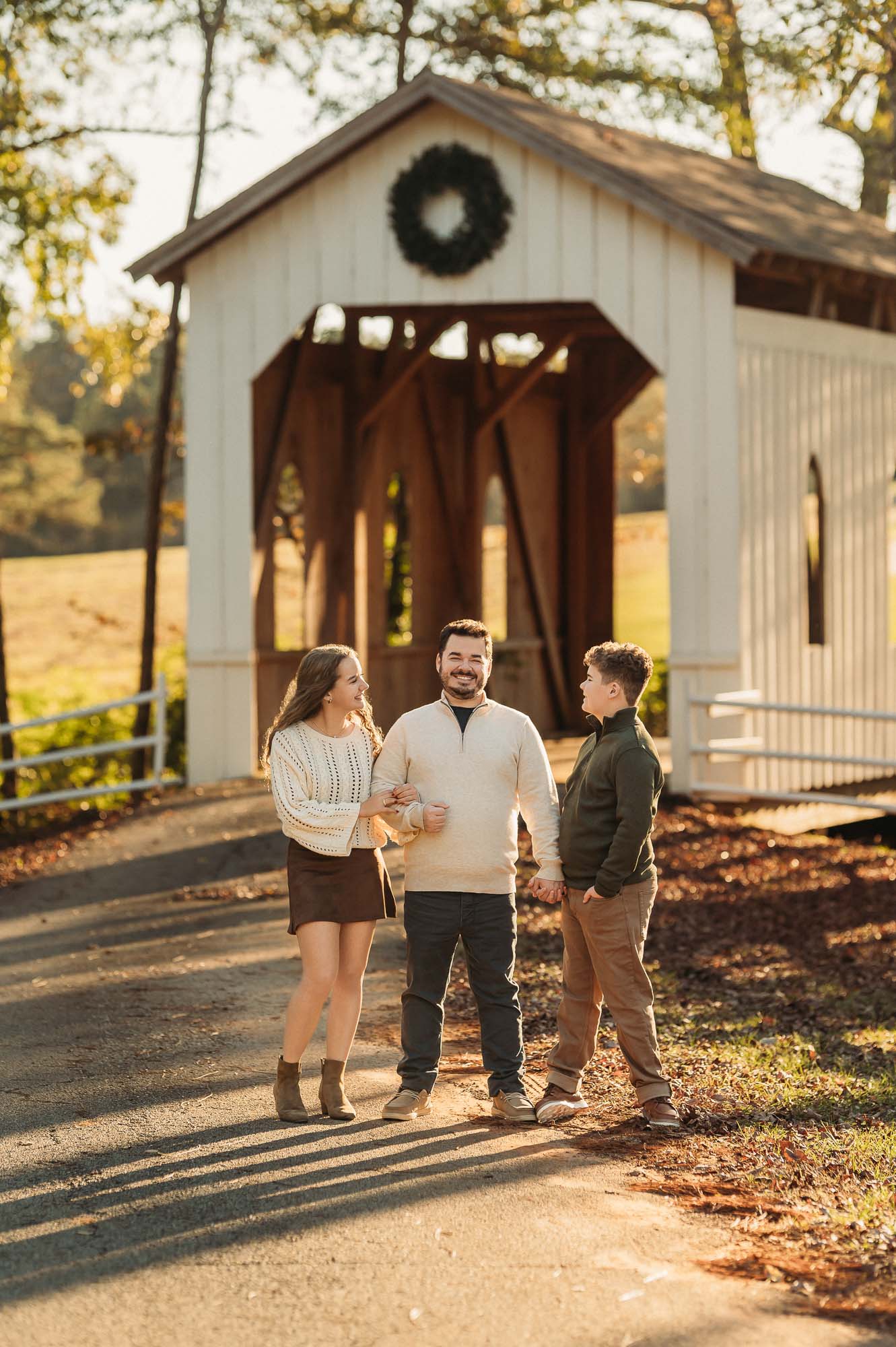 Family portraits on a wood bridge at The Madeaux | Flint Texas Family Photographer