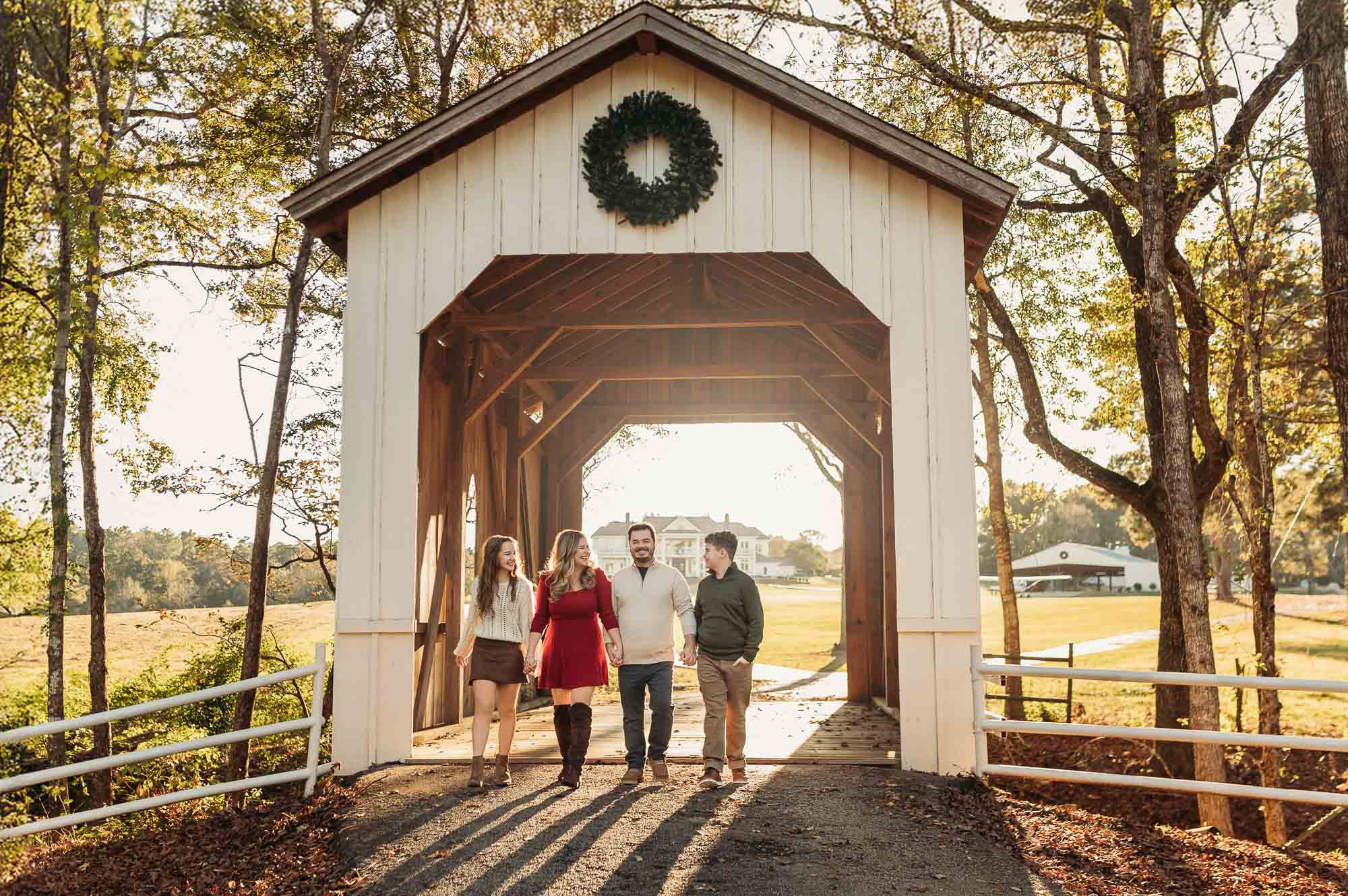 Family portraits on a wood bridge at The Madeaux | Flint Texas Family Photographer
