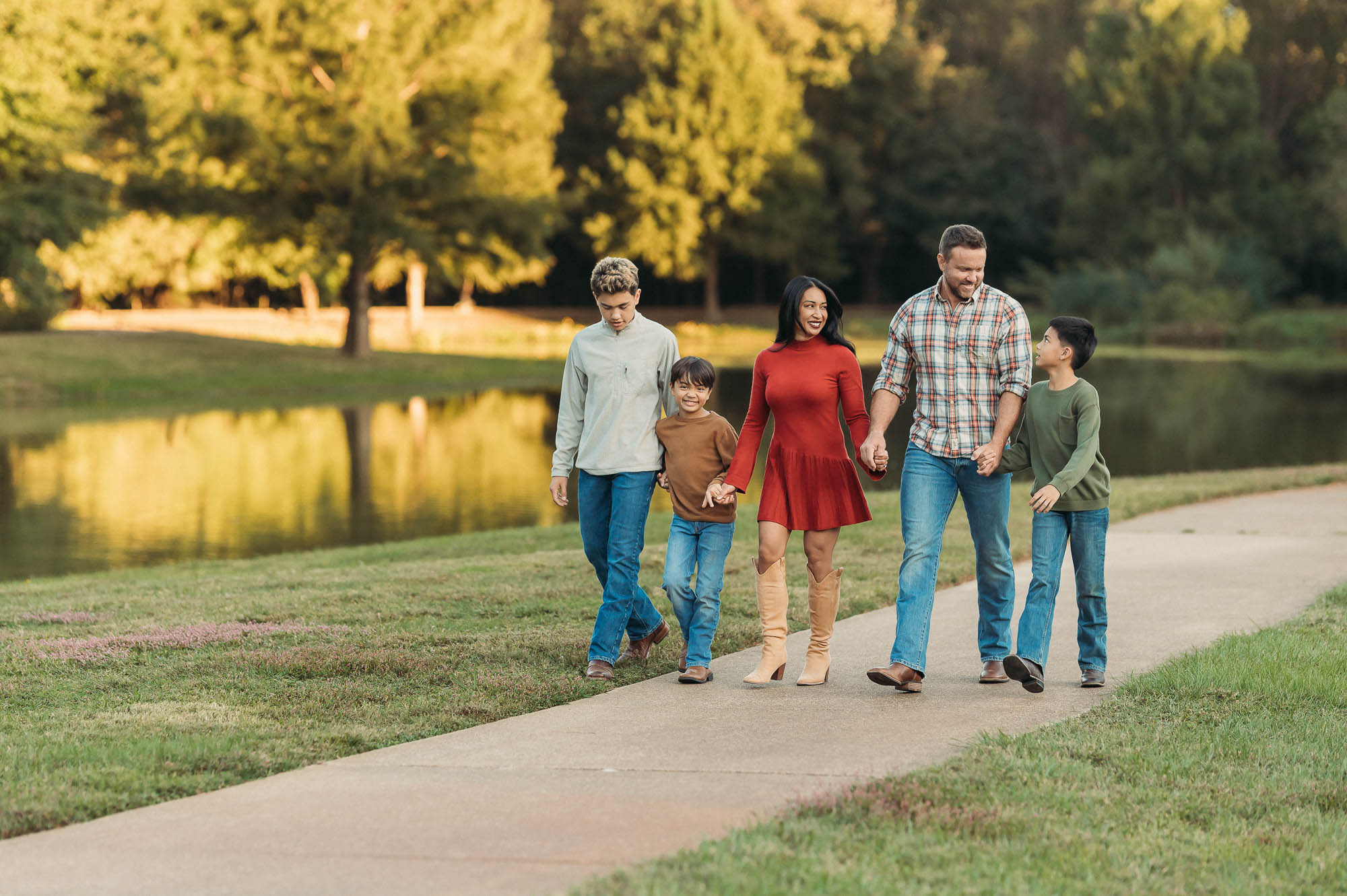 family walking together on path by the water | Family Session in Tyler TX
