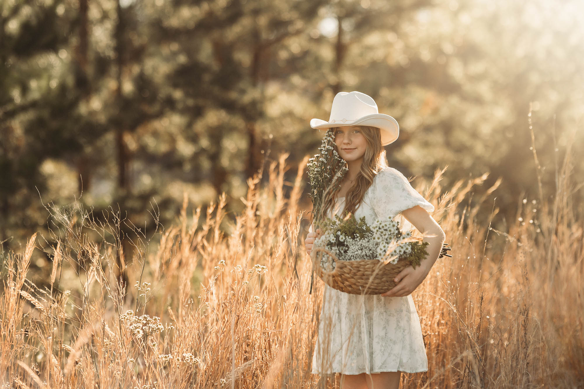 Child carrying a basket of wildflowers | East Texas Child Photographer
