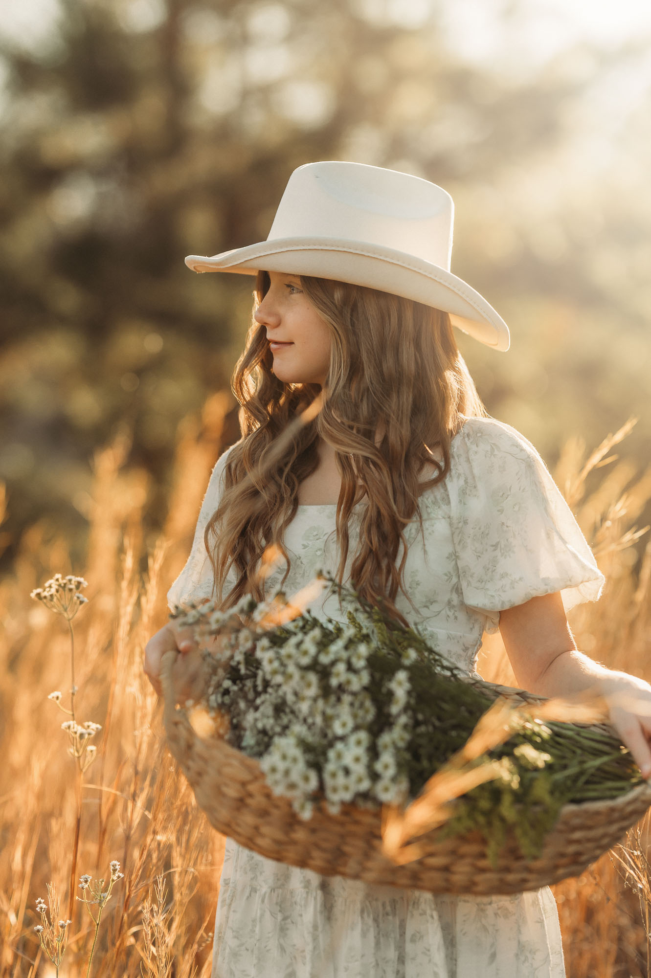 girl carrying a basket of wildflowers | East Texas child Photographer