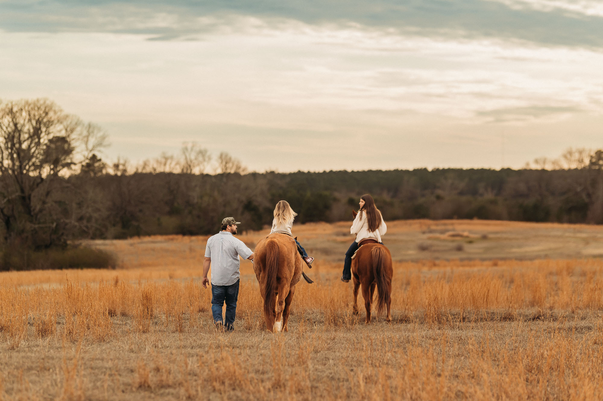 Family Riding Horses in an open meadow | East Texas Equestrian Family Photographer