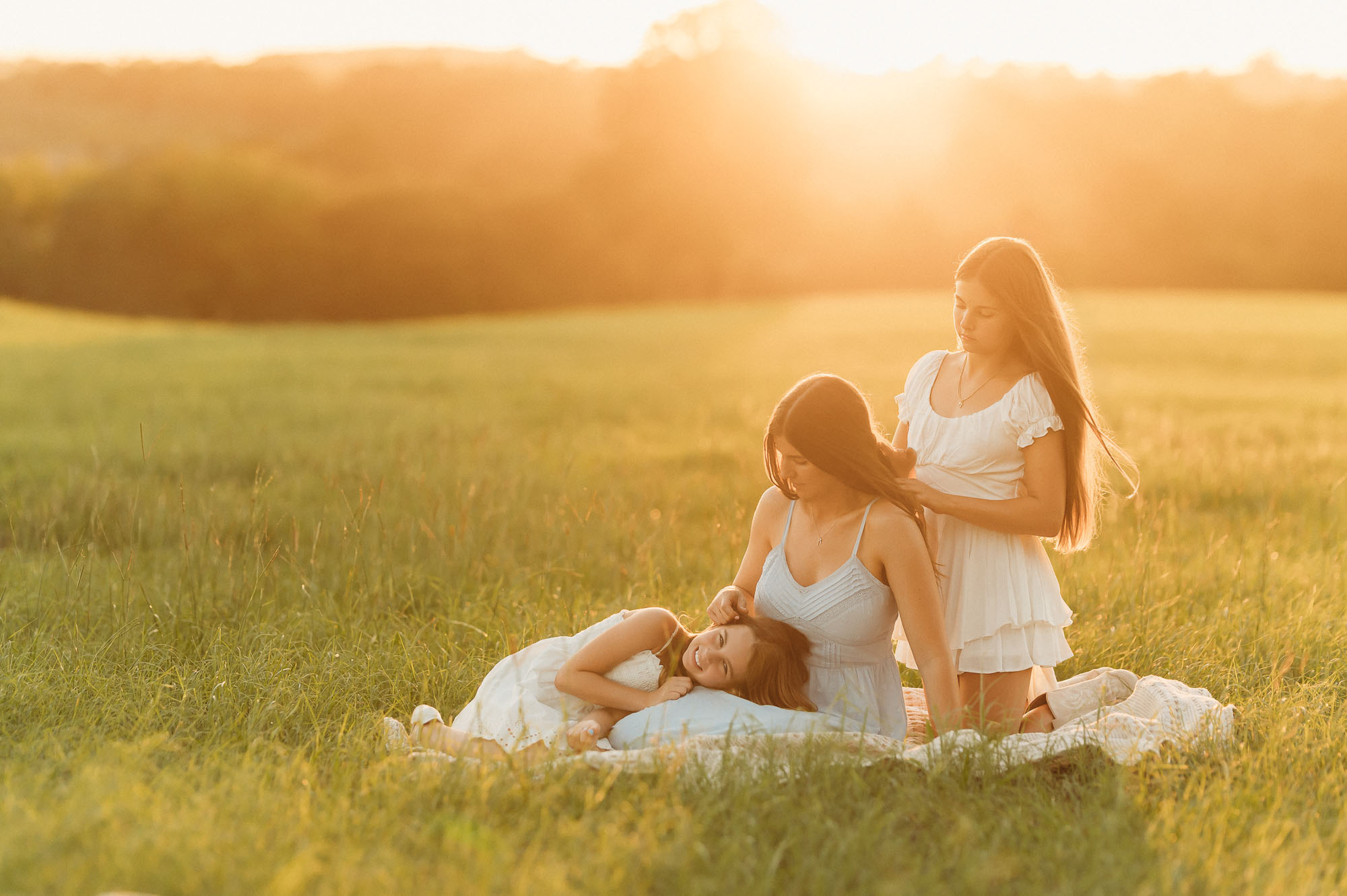 Mother and daughters playing in a meadow | Motherhood Photography Tyler TX