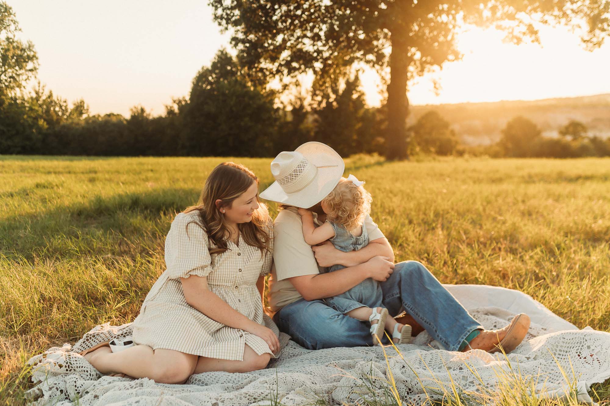 Portrait of Dad snuggling with family | East Texas Pregnancy Photographer