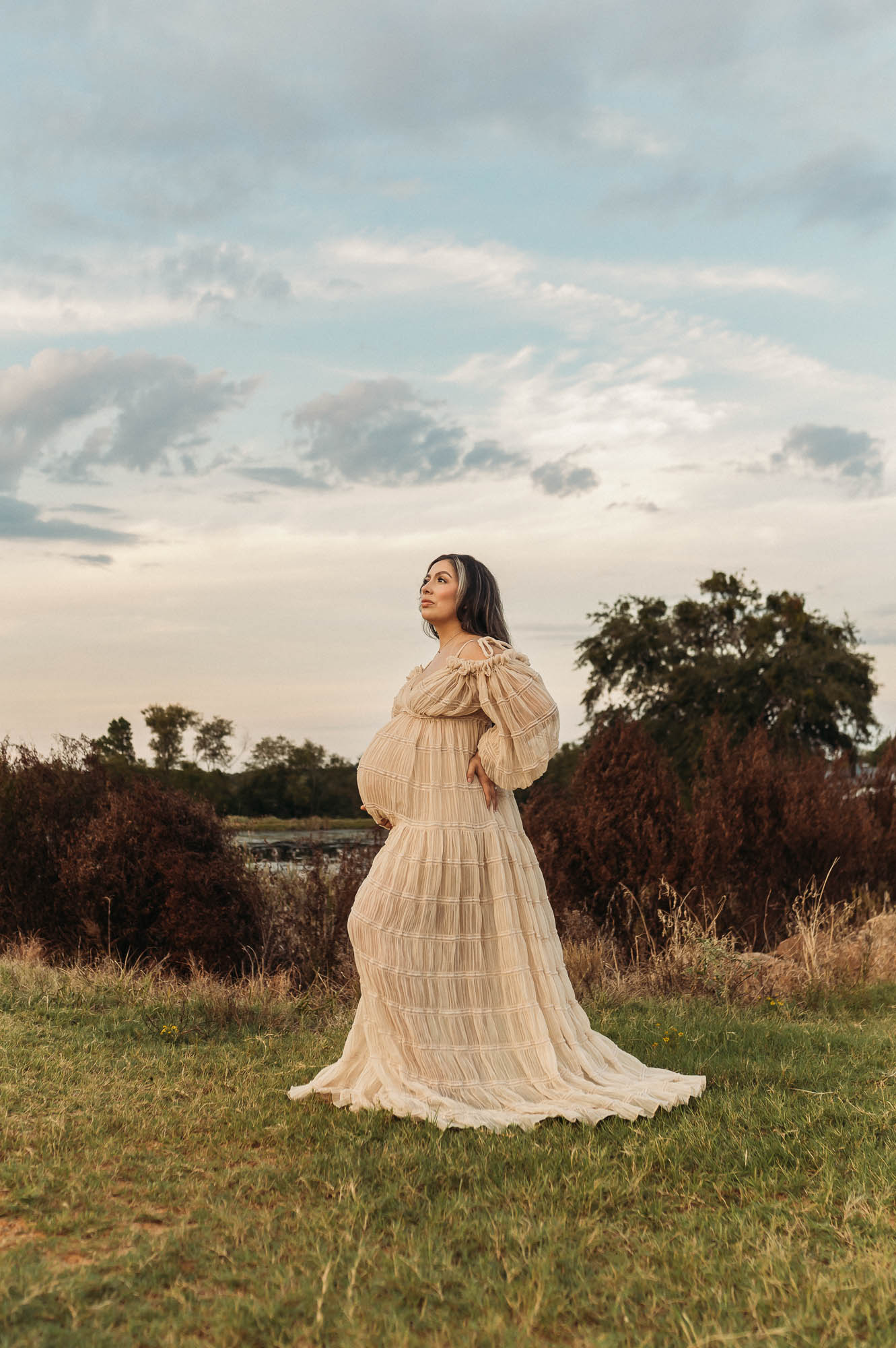 Maternity portrait of expecting mother during blue hour in Tyler Texas