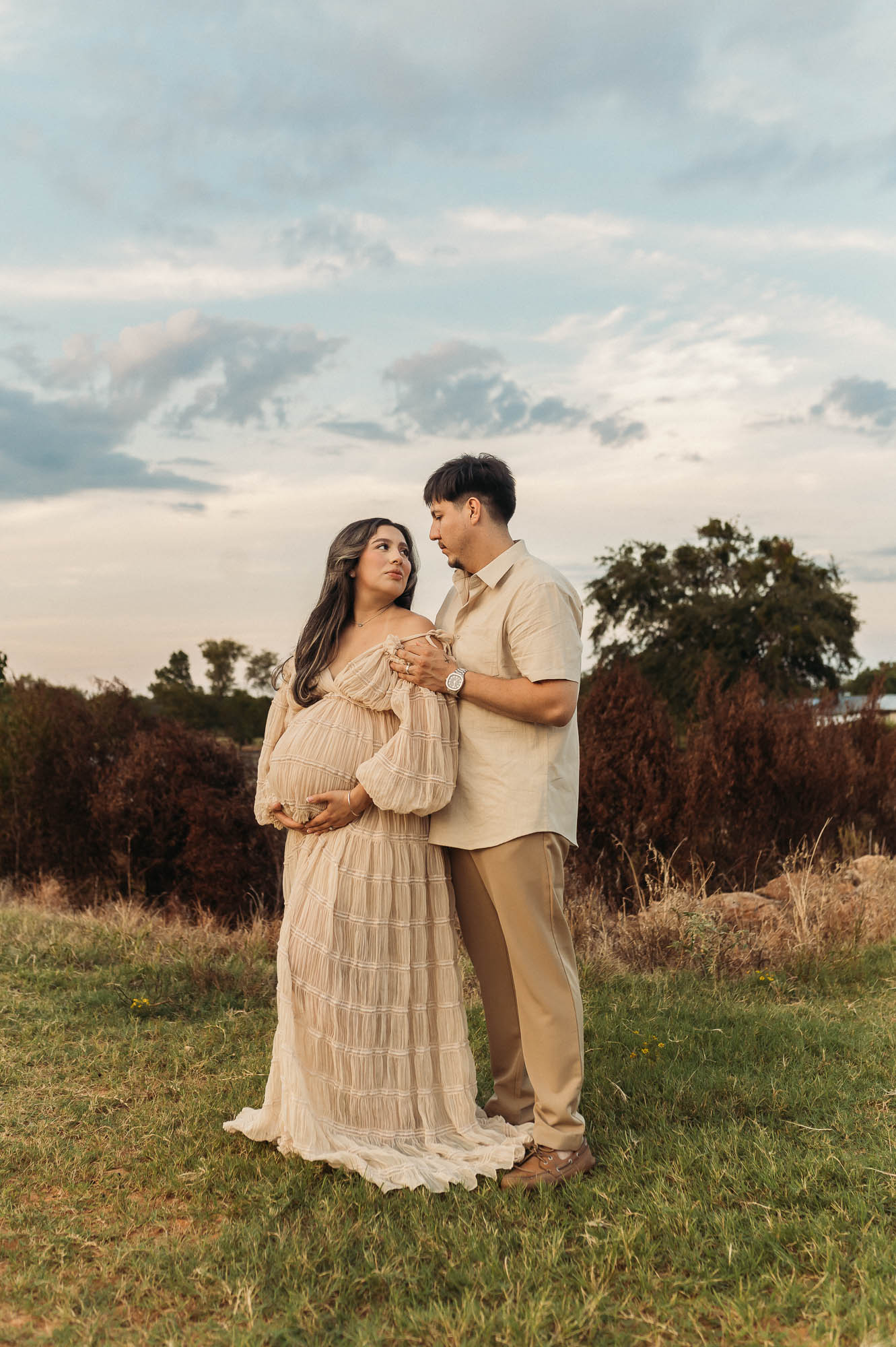 Maternity portrait of expecting mother during blue hour in Tyler Texas
