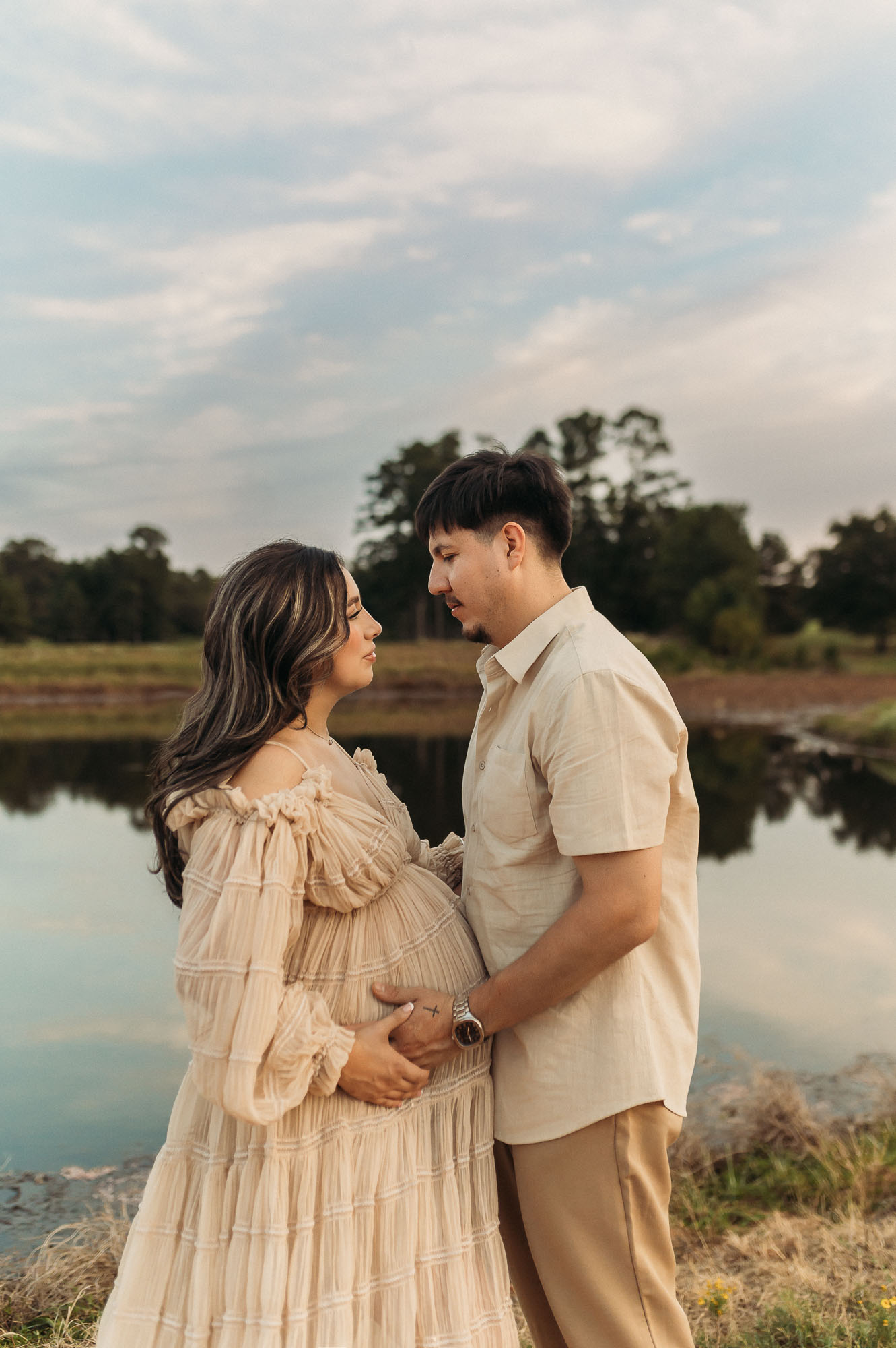 Maternity portrait of expecting mother during blue hour in Tyler Texas